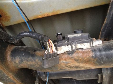 15 . . Where is the fuel pump control module located on a 2008 chevy silverado